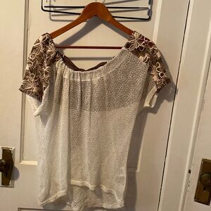 Women’s short sleeve top. Cream and brown in color